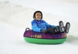Ice Slides, Downhill Donuts & Sledging at The Snow Centre Manchester – Snow Park Pass with Drink for 2 People (£29 for 4)